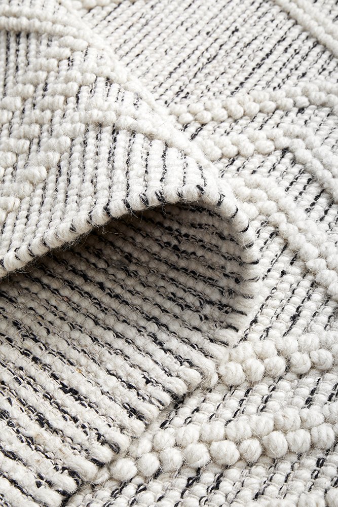 LARA OFF-WHITE WOOL BLEND RUG FOLDED